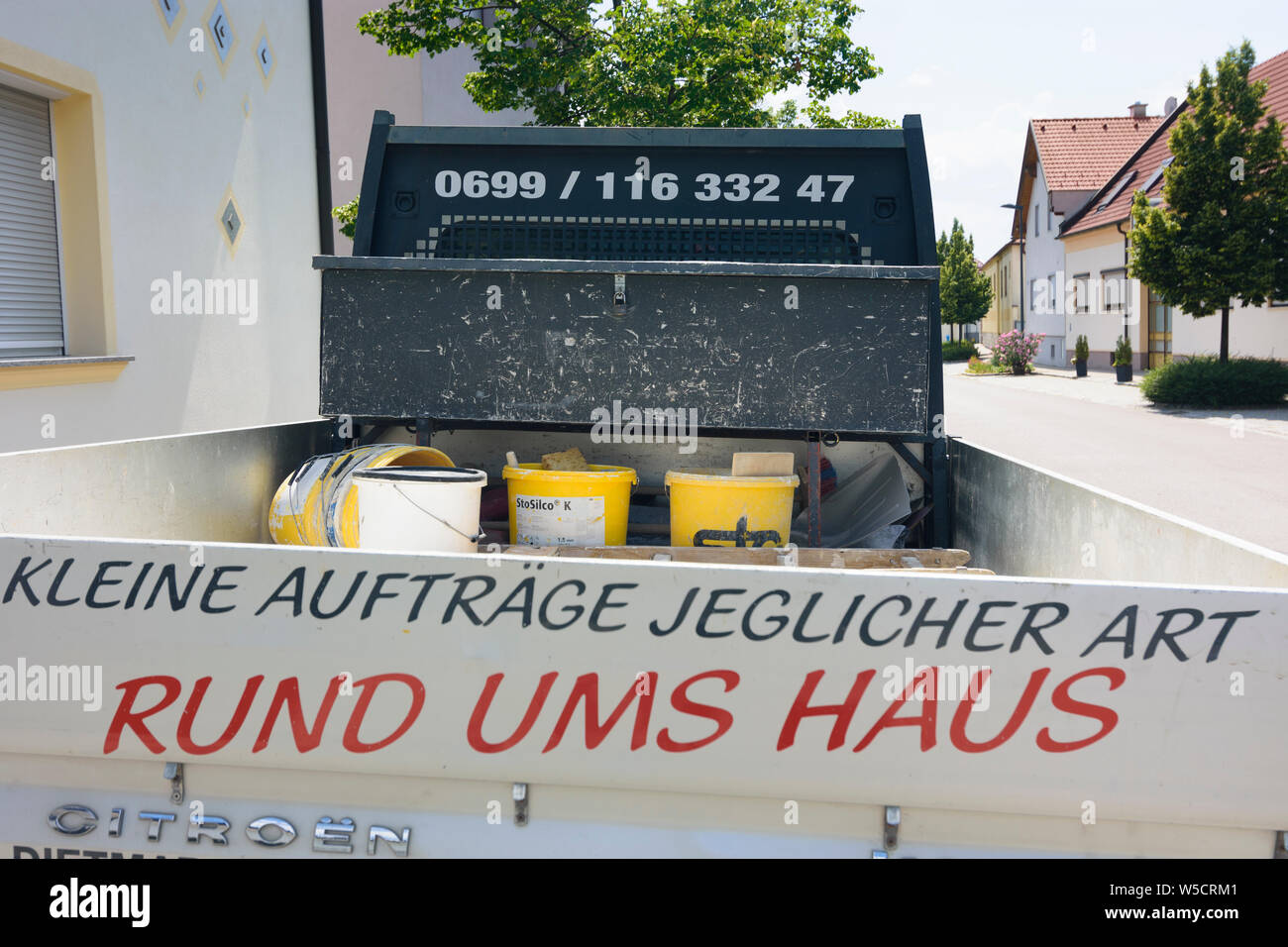 : truck with labeling 'Kleine Aufträge jeglicher Art', small business in , Burgenland, Austria Stock Photo