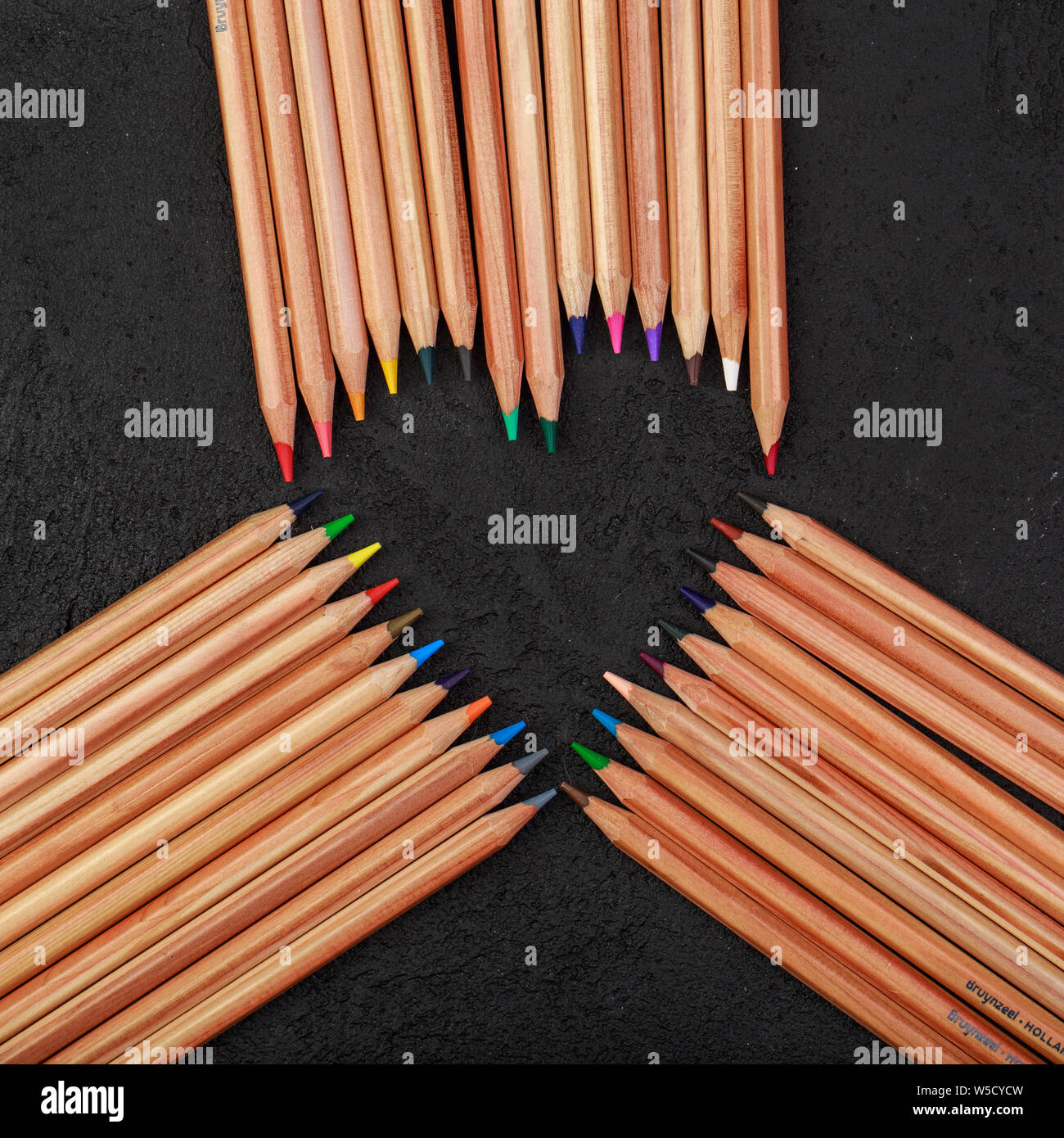 Background from color pencils on black background Stock Photo
