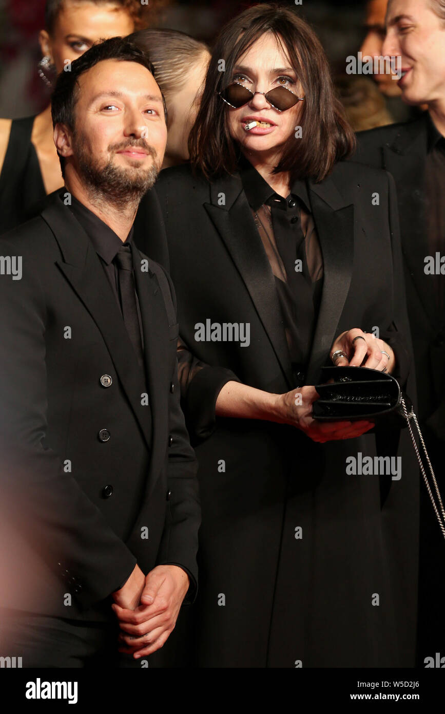 CANNES FRANCE MAY 18 Anthony Vaccarello and Beatrice Dalle