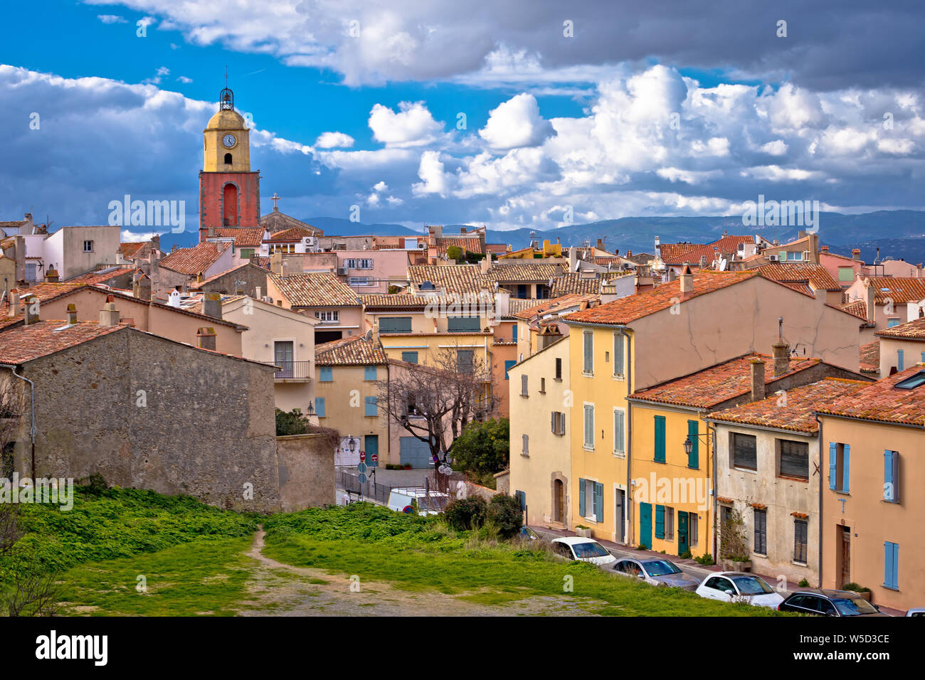 Saint Tropez village church tower and old rooftops view, famous tourist destination on Cote d Azur, Alpes-Maritimes department in southern France Stock Photo