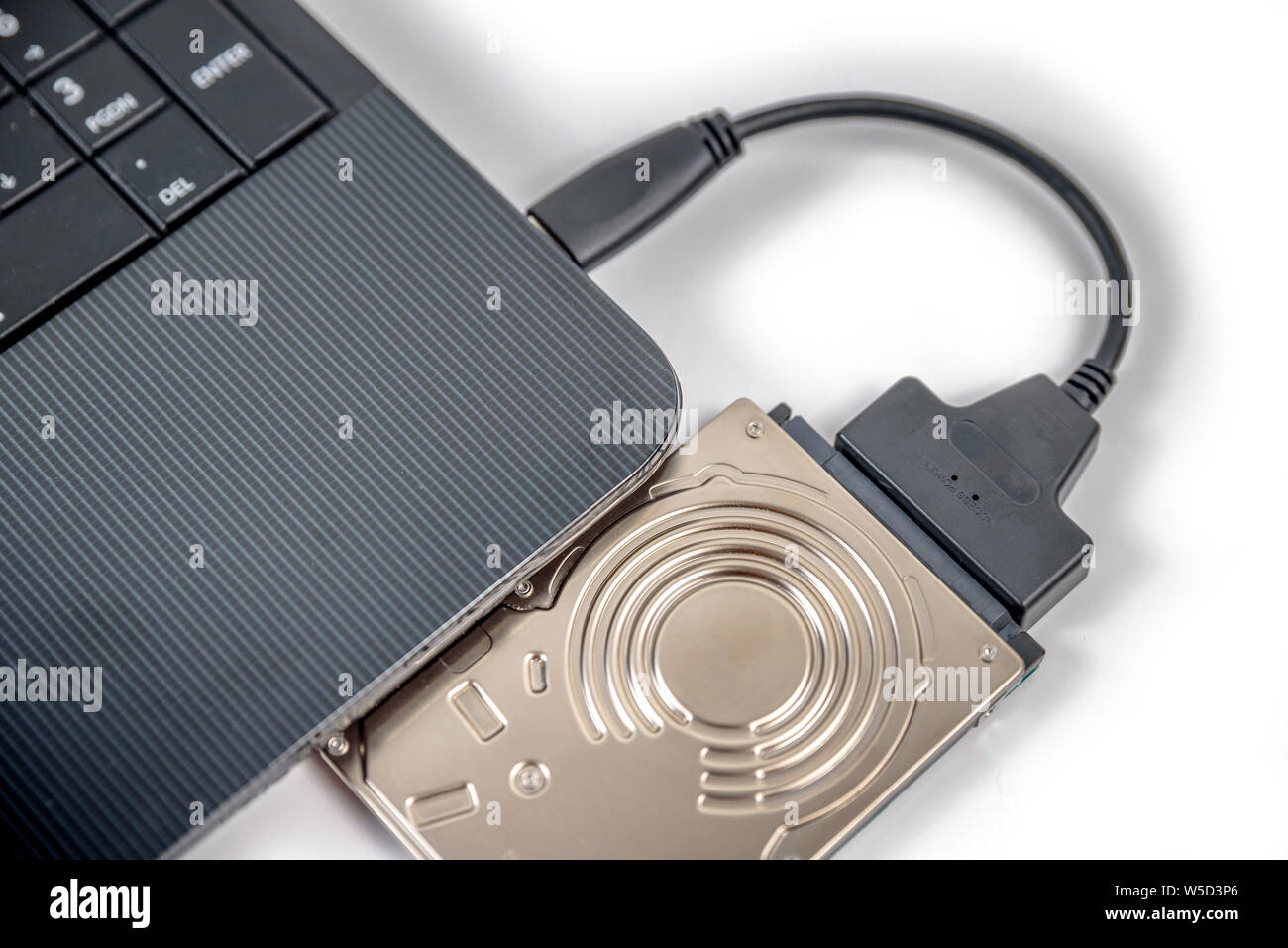 Connect Internal Laptop Hard Drive to USB: Effortless Guide 3 hdd 25 internal hard drive disk connected to laptop via sata usb cable closeup view W5D3P6 Connect Internal Laptop Hard Drive to USB: Effortless Guide