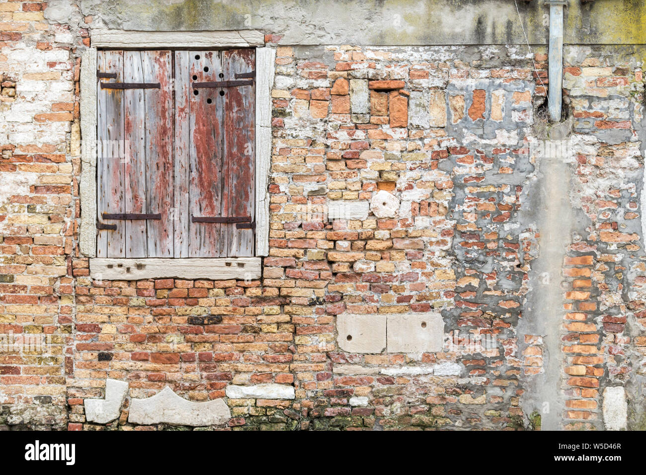 Old brick wall with vintage wooden window Stock Photo - Alamy