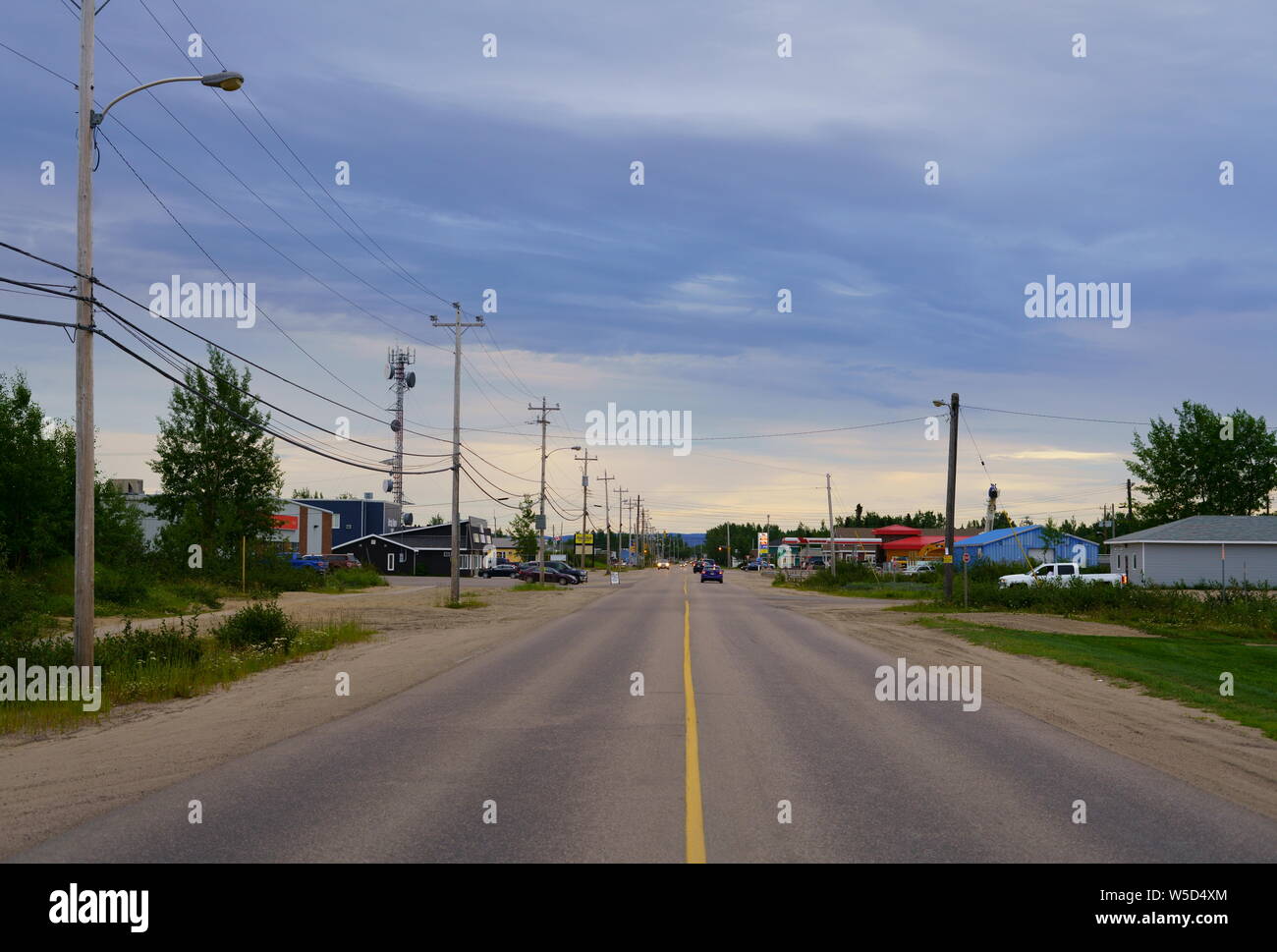 Hamilton River Road in Happy Valley-Goose Bay, province of Newfoundland and Labrador, Canada. Street scenery in summer, during sunset. Stock Photo