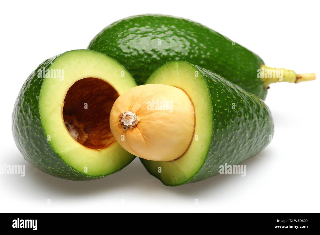 Whole and half green avocados isolated on white background Stock Photo ...