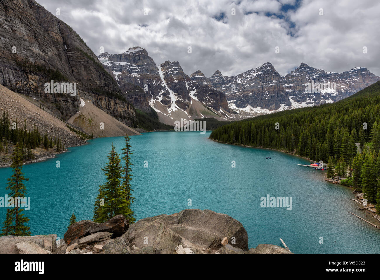 Moraine lake in Banff National Park at cloudy day, Canada. Stock Photo