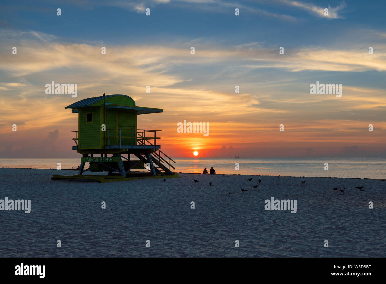 Miami Beach at sunrise and life guard tower, South Miami Beach, Florida. Stock Photo