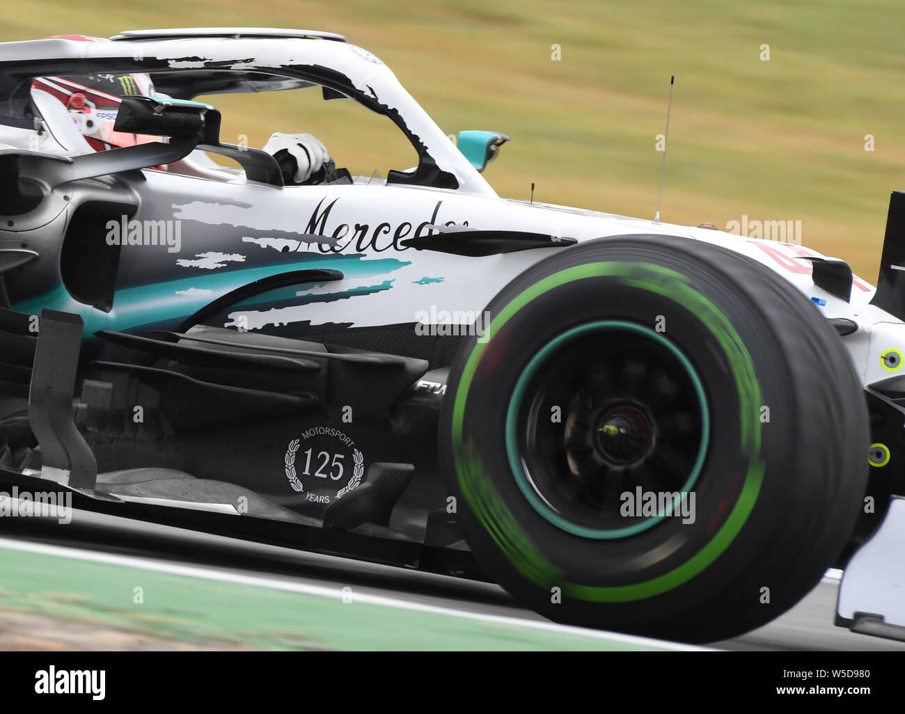Hockenheim, Germany. 28th July, 2019. Motorsport: Formula 1 World Championship, Grand Prix of Germany. Lewis Hamilton from Great Britain of the Mercedes-AMG Petronas team drives across the track. Credit: Uli Deck/dpa/Alamy Live News Stock Photo
