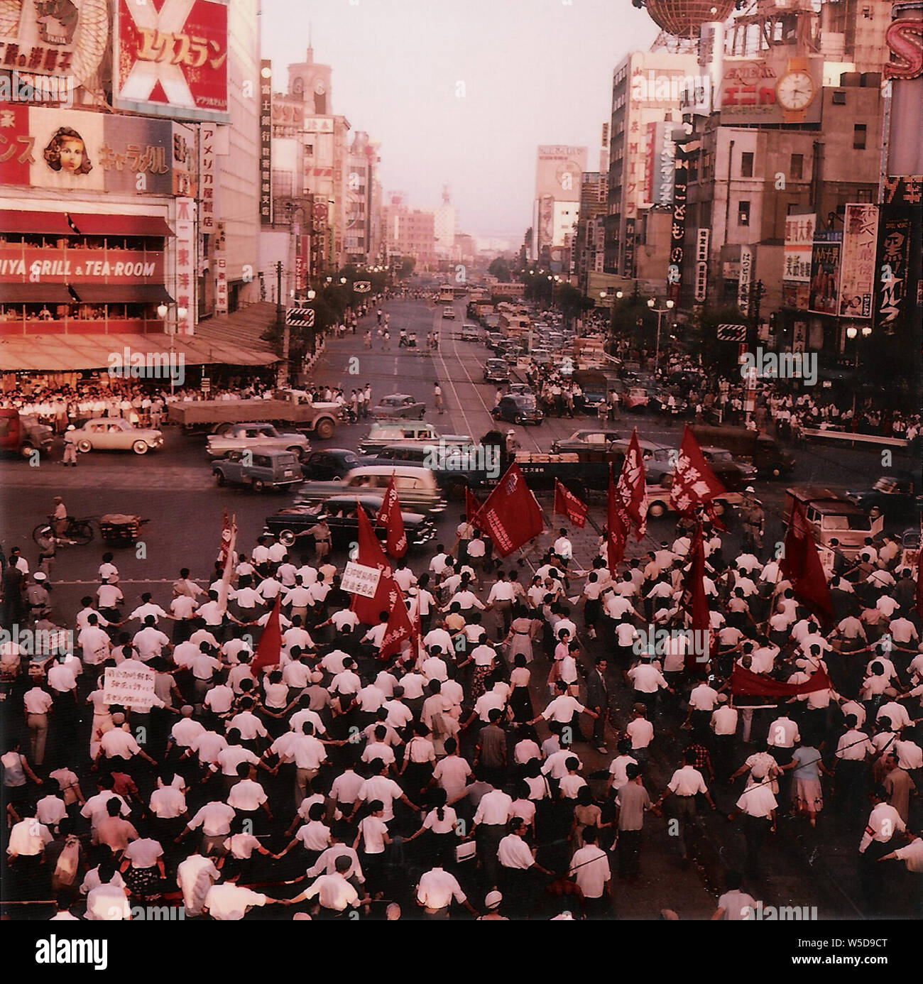 [ 1960s Japan - Street Protest in Tokyo ] —   Demonstration at Sukiyabashi crossing (数寄屋橋交差点) in Tokyo's Ginza, ca. 1960 (Showa 35). Stock Photo