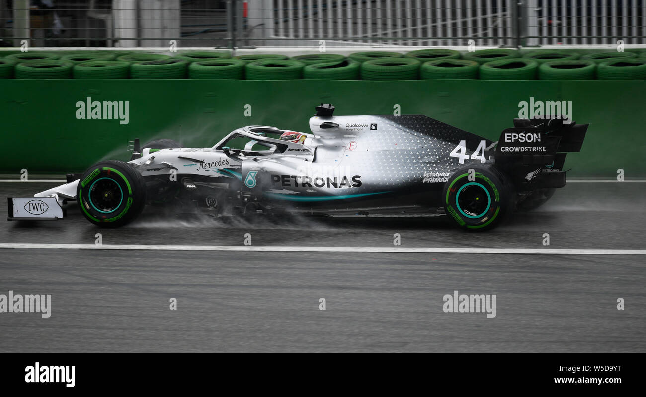 Hockenheim, Germany. 28th July, 2019. Motorsport: Formula 1 World Championship, Grand Prix of Germany. Lewis Hamilton from Great Britain of the Mercedes-AMG Petronas team drives across the track. Credit: Fabian Sommer/dpa/Alamy Live News Stock Photo