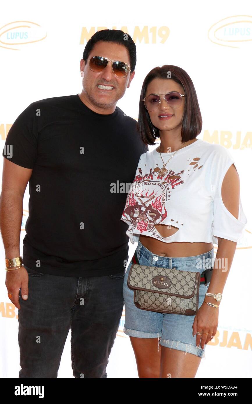 Reza Farahan, Golnesa Gharachedaghi at arrivals for Third Annual Michael B. Jordan and Lupus LA Jam MBJAM19, Dave & Busters, Los Angeles, CA July 27, 2019. Photo By: Priscilla Grant/Everett Collection Stock Photo