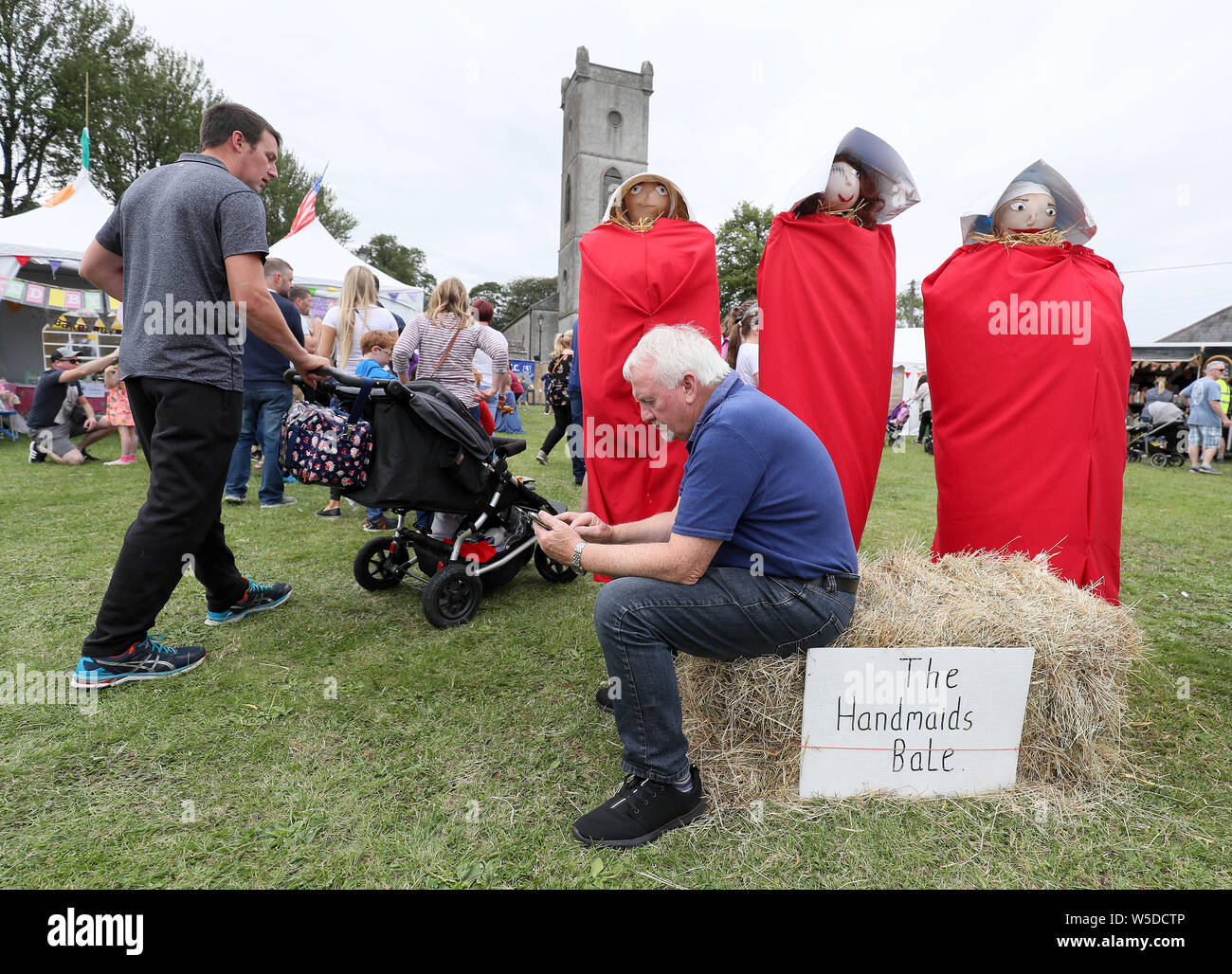 Scarecrows titled 'The Handmaids Bale' at the 10th Durrow Scarecrow Festival, which takes place annually in Durrow, Co. Laois, Ireland. Stock Photo