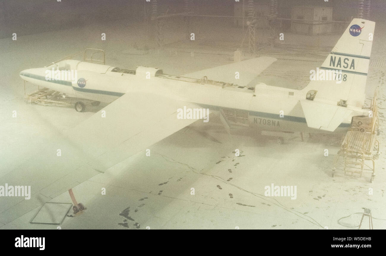 This American U-2 single-engine jet aircraft is undergoing freezing flight conditions inside a specialized hanger that can simulate weather conditions ranging from Arctic cold to desert heat to jungle moisture at Elgin Air Force Base in Florida, USA. Notice the black footprints on the frosty floor in this ghostly image that was taken through a window into the McKinley Climatic Laboratory. Temperatures in the chamber can range from -65 degrees to +165 degrees Fahrenheit (-54 to +74 Celsius) with a simulation of various climatic conditions, including snow, heat, rain, wind, sand and dust. Stock Photo