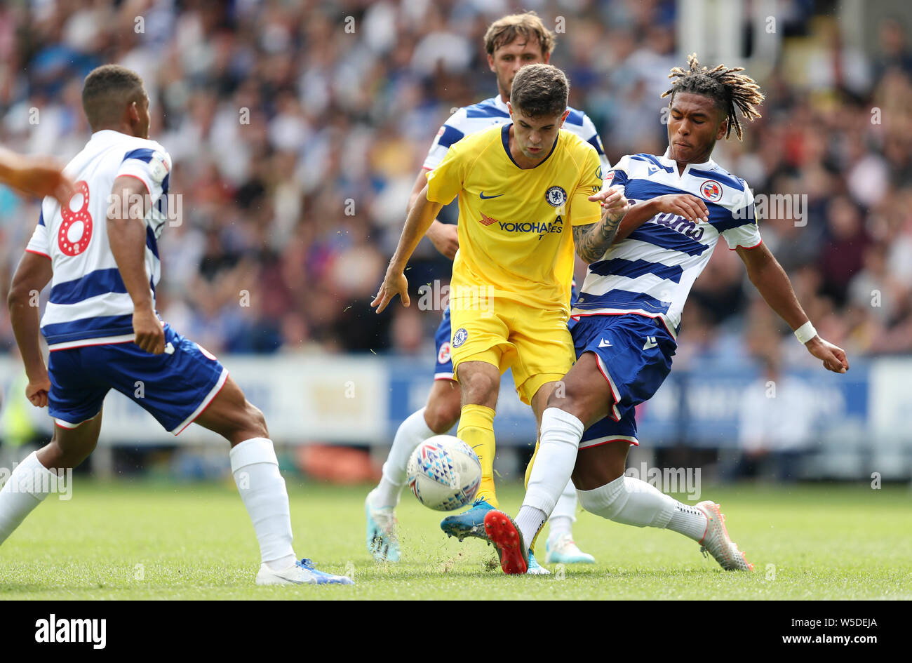 Chelsea's Christian Pulisic (left) and Reading's Danny Loader battle for the ball during the pre-season friendly match at the Madejski Stadium, Reading. Stock Photo