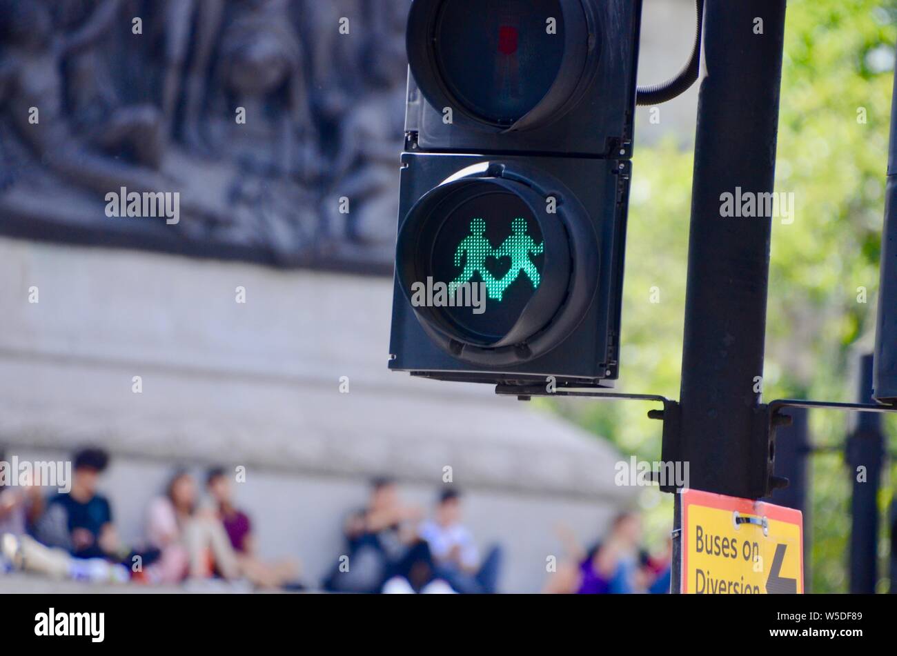 two green man figures on pedestrian crossing central london uk Stock Photo