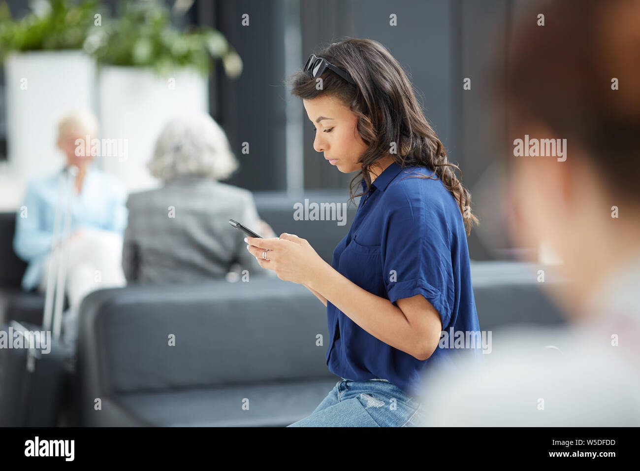 Serious brunette woman hi-res stock photography and images - Alamy