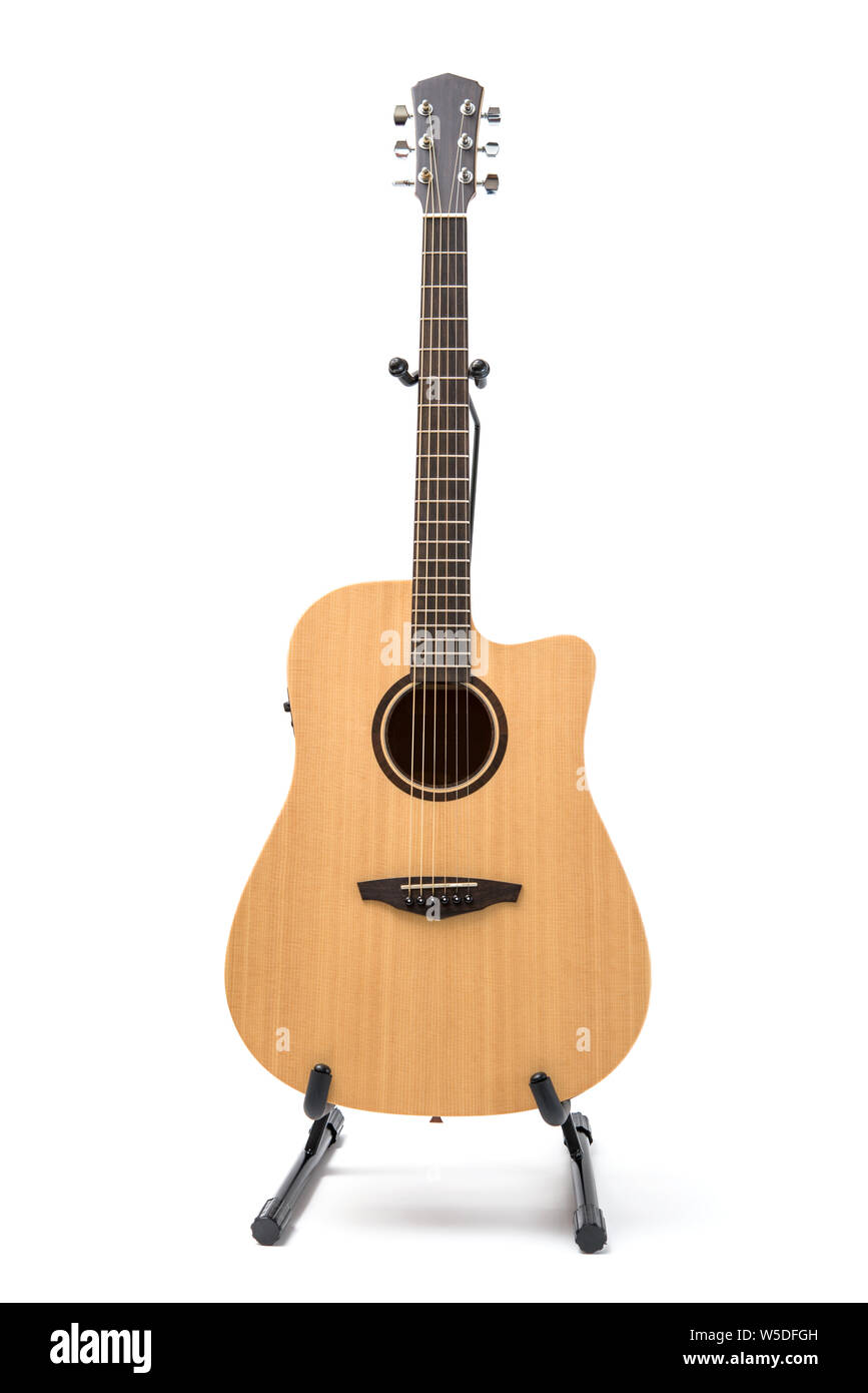 acoustic guitar with stand isolated on white background Stock Photo