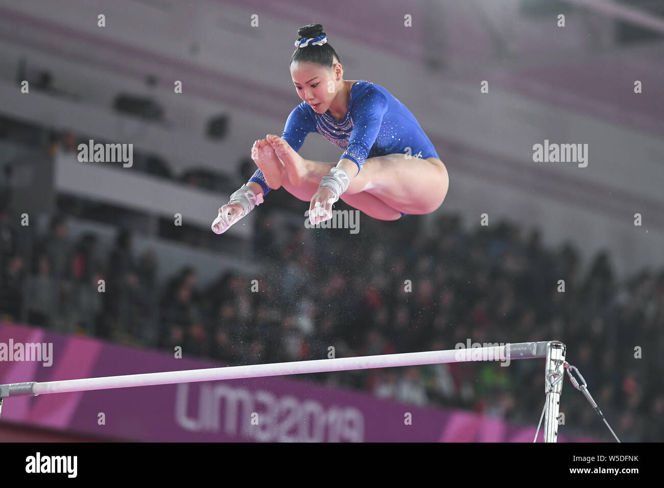 July 27, 2019, Lima, Peru: KARA EAKER, from the US, competes on the uneven bars during the team finals competition held in the Polideportivo Villa El Salvador  in Lima, Peru. (Credit Image: © Amy Sanderson/ZUMA Wire) Stock Photo
