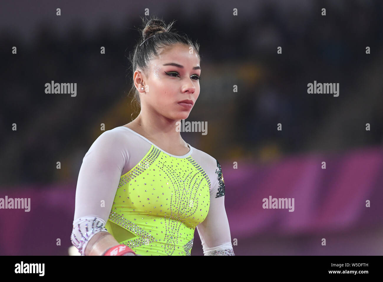 July 27, 2019, Lima, Peru: FLAVIA SARAIVA from Brazil concentrates before her uneven bars routine during the team finals competition held in the Polideportivo Villa El Salvador  in Lima, Peru. (Credit Image: © Amy Sanderson/ZUMA Wire) Stock Photo