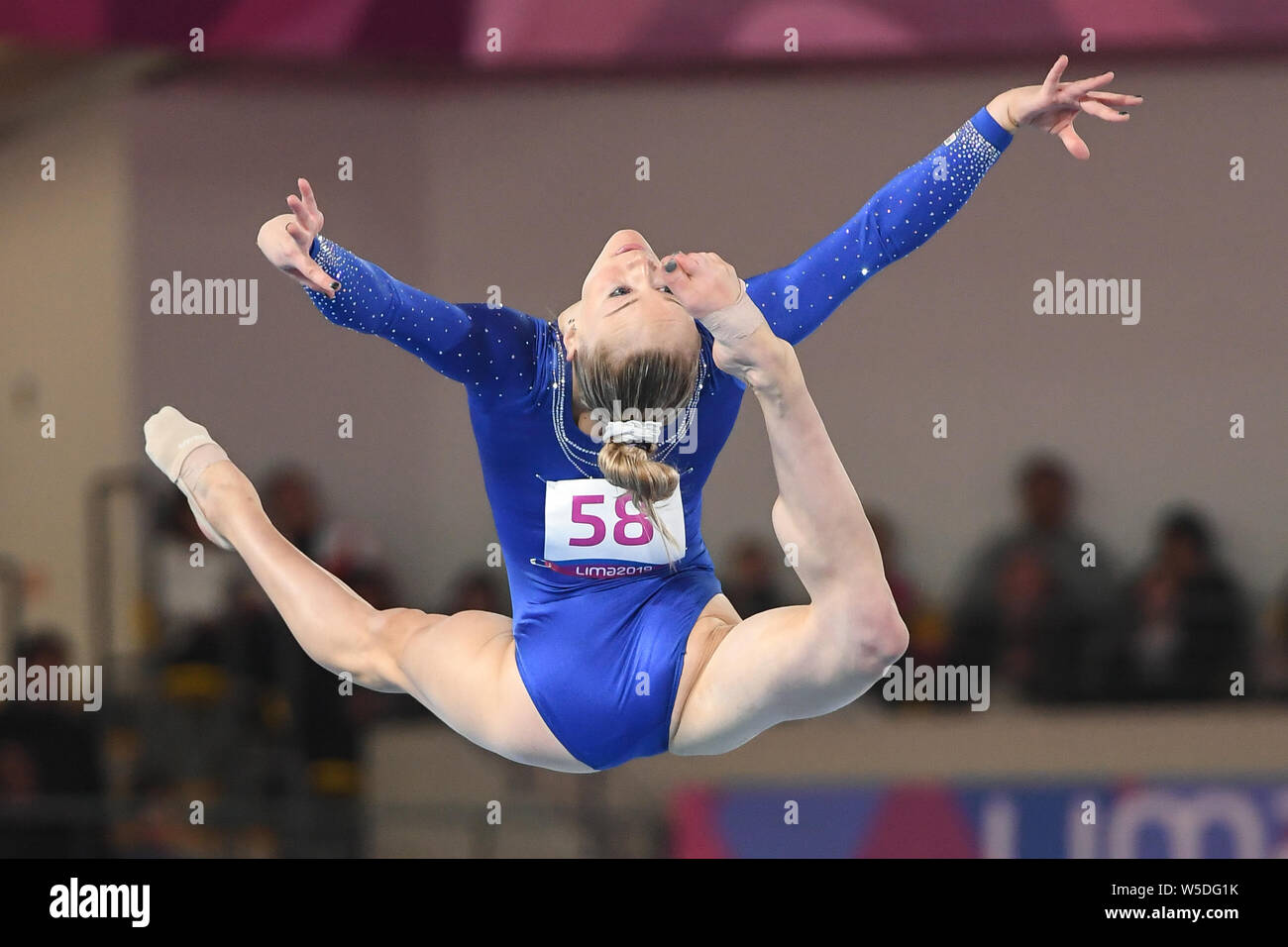 July 27, 2019, Lima, Peru: RILEY MCCUSKER, from the US, competes on the floor exercise during the team finals competition held in the Polideportivo Villa El Salvador  in Lima, Peru. (Credit Image: © Amy Sanderson/ZUMA Wire) Stock Photo