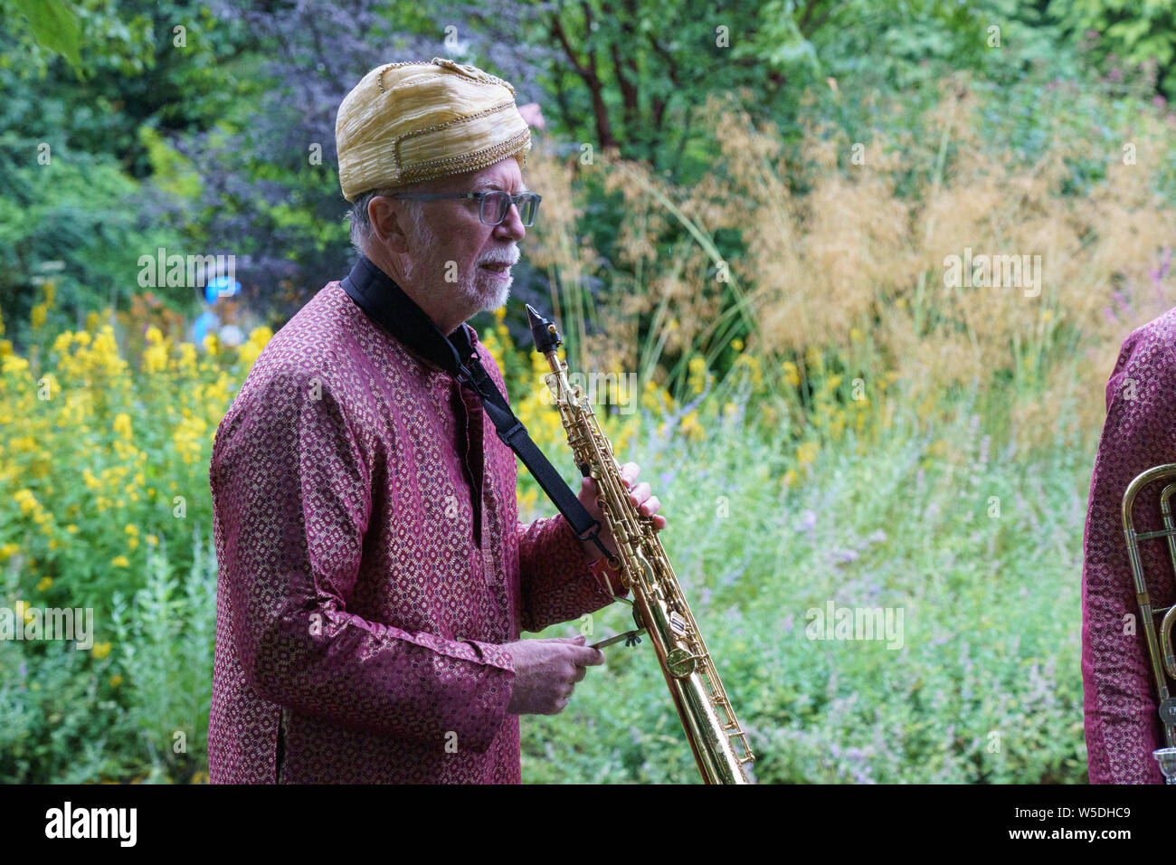 Saxaphone player from The Bombay Baja Brass Band, Valley Gardens Carnival, Harrogate, North Yorkshire, England, UK. Stock Photo