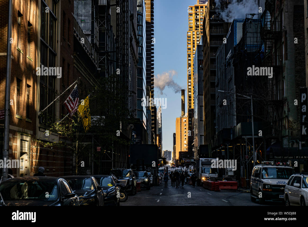New York, USA - NOVEMBER 2018: Manhattan street with smoke and work in progress Stock Photo