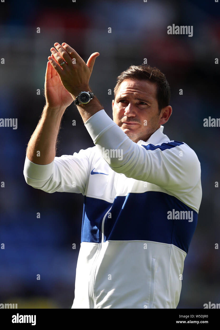 Chelsea manager Frank Lampard applauds the fans after the final whistle during the pre-season friendly match at the Madejski Stadium, Reading. Stock Photo