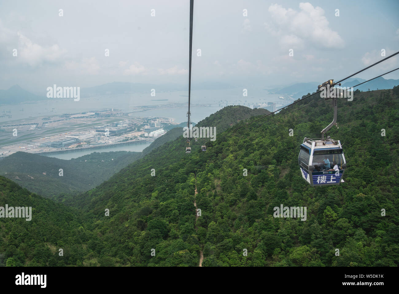 Cable Car ride ti Big Buddha, Hong Kong Stock Photo - Alamy
