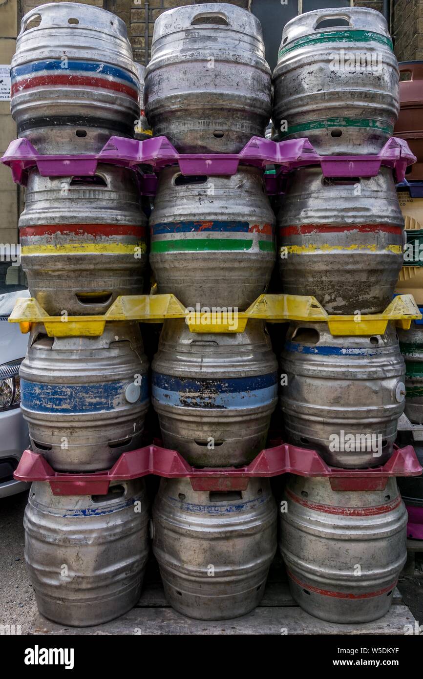 multicoloured steel Beer kegs stacked. Stock Photo
