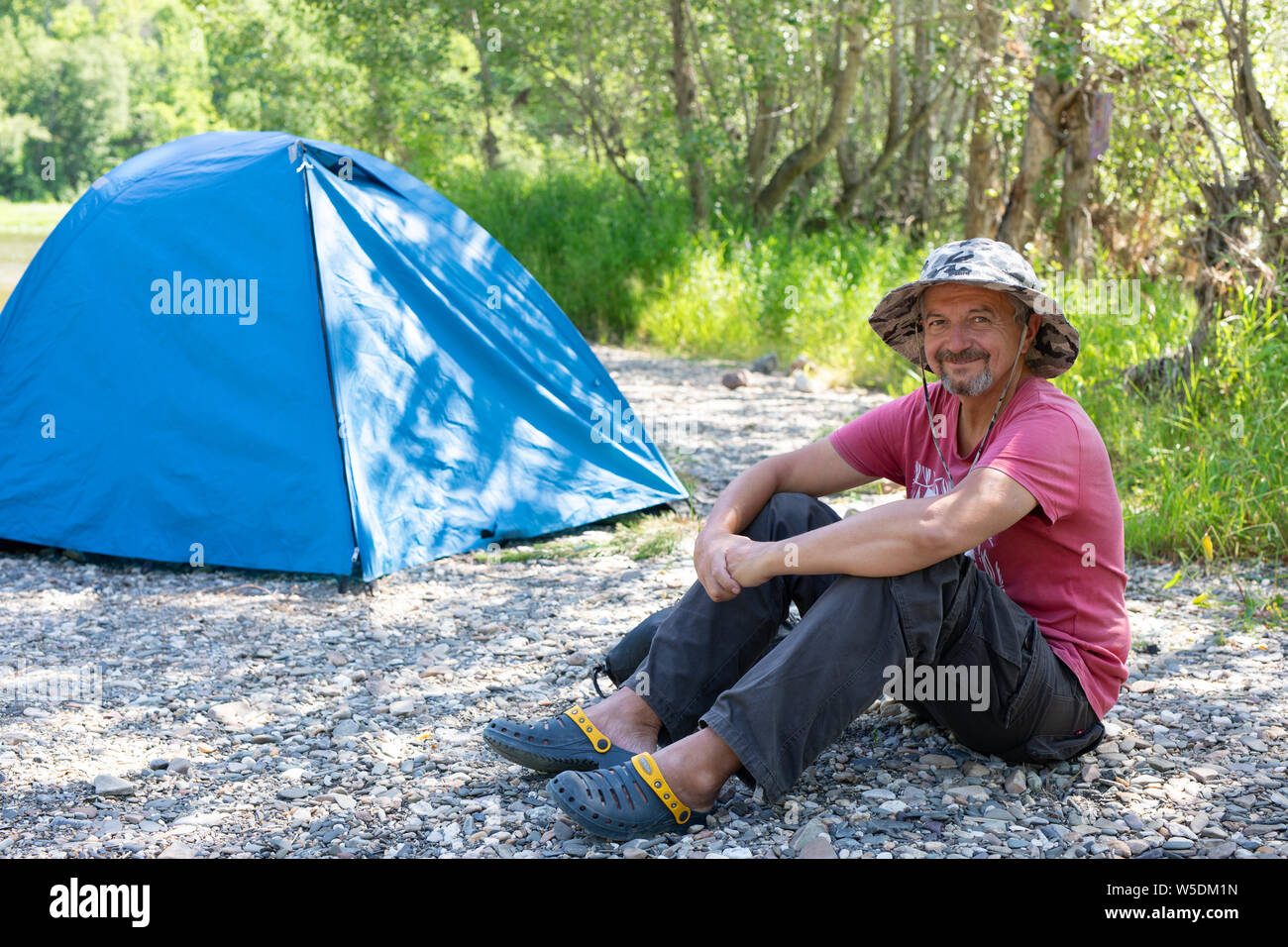 active lifestyle in old age concept, camping, tourism tourism in the elderly grow Stock Photo