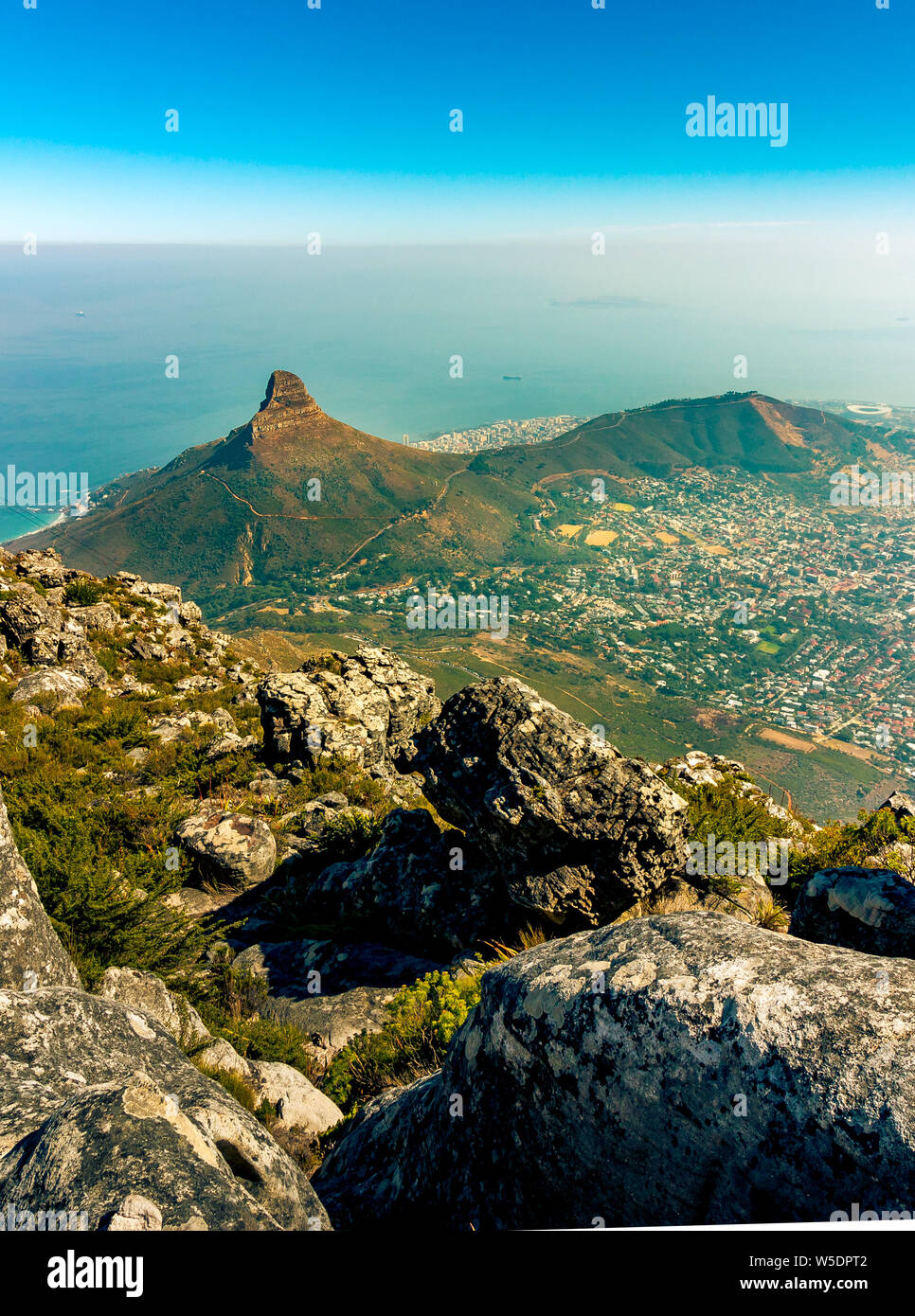 Cape Town, South Africa: looking down at the coastline and Lions Head mountain from Table Top Mountain. Stock Photo