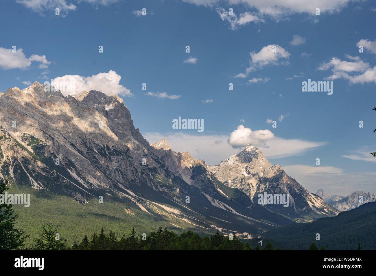 Beautiful landscape with green forest and rocky mountain Stock Photo ...