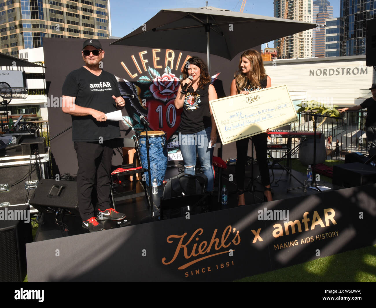 Kevin Robert Frost, Camie Mokma and Gina Najera attends the10th Anniversary Of Kiehl's LifeRide For amfAR To Benefit HIV/AIDS Research in Century City at Westfield Century City in Century City  on July 27 2019. Stock Photo