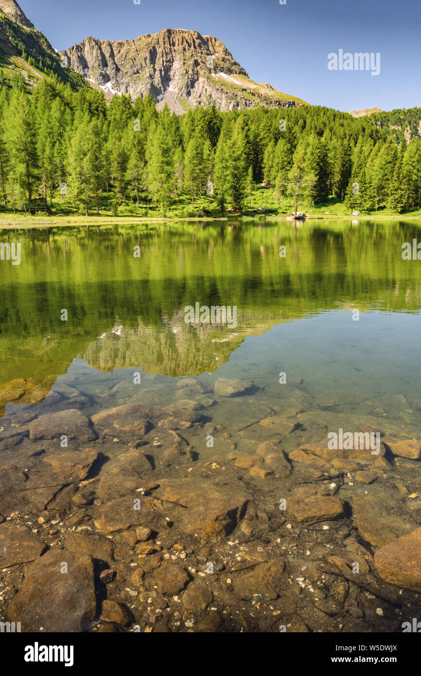 Scenic landscape with mountain, forest and lake Stock Photo - Alamy