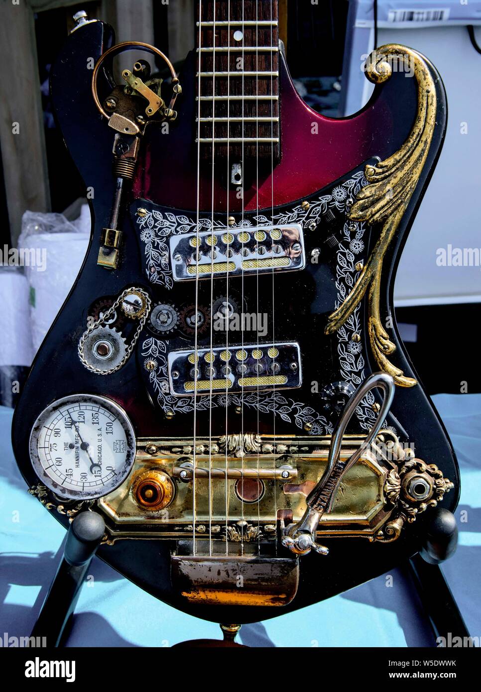 Dearborn, Michigan, USA. 28th July, 2019. Detail of a guitar by Steampunk  Fabricators on display during the 10th Annual Maker Faire Detroit at the  Henry Ford Museum of American Innovation. Maker Faire