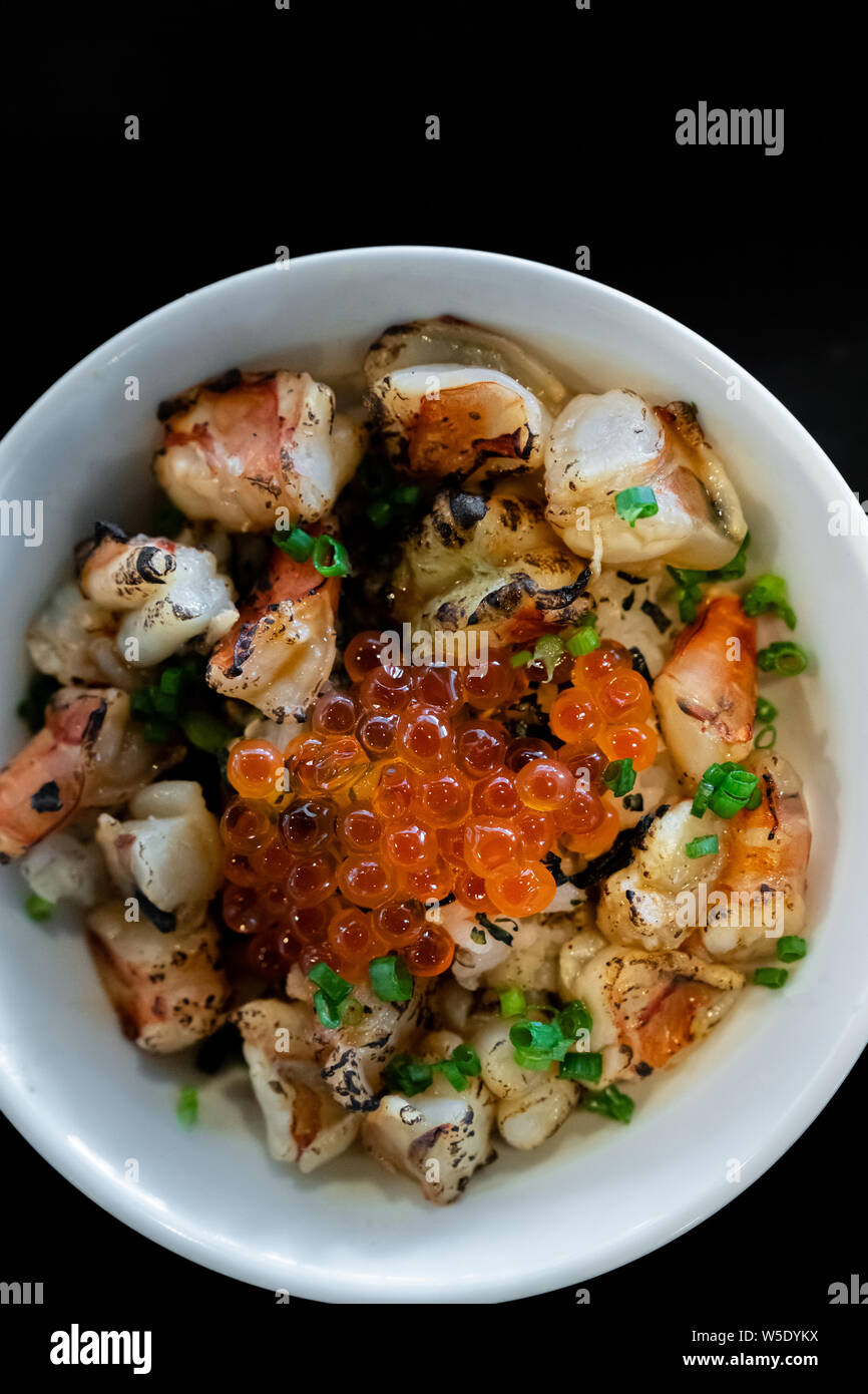 grilled prawn shrimp ebidon Donburi with salmon roe and egg Stock Photo