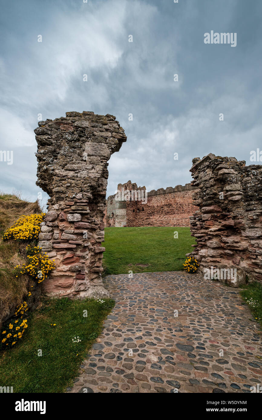 Ancient stone pillars marking the entrance to the 14th century fortress