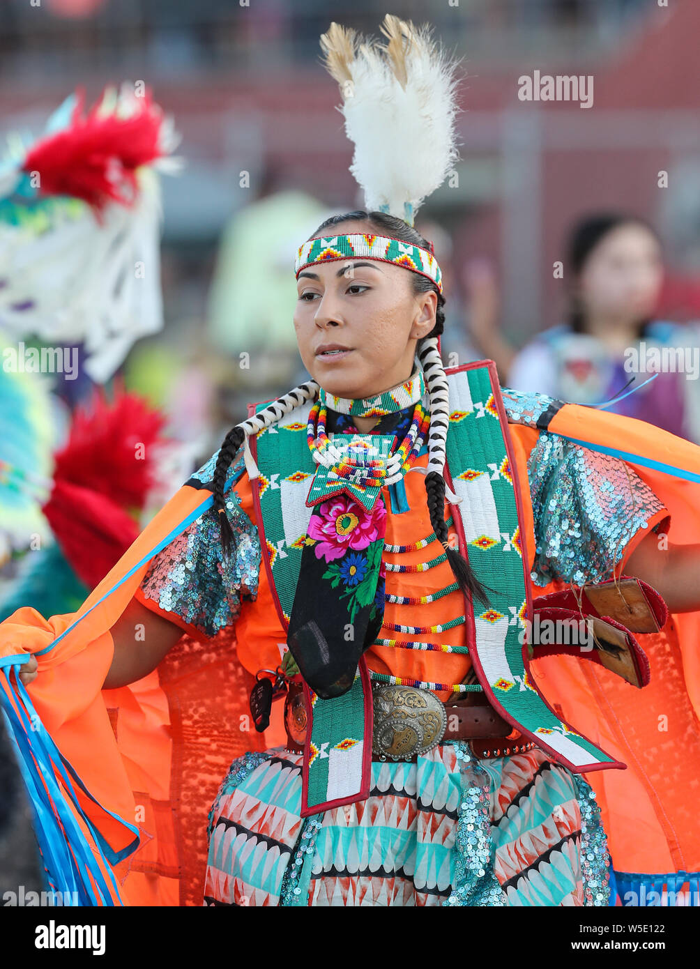Dancers perform during the Grand Entry of the Julyamsh Pow Wow in Coeur