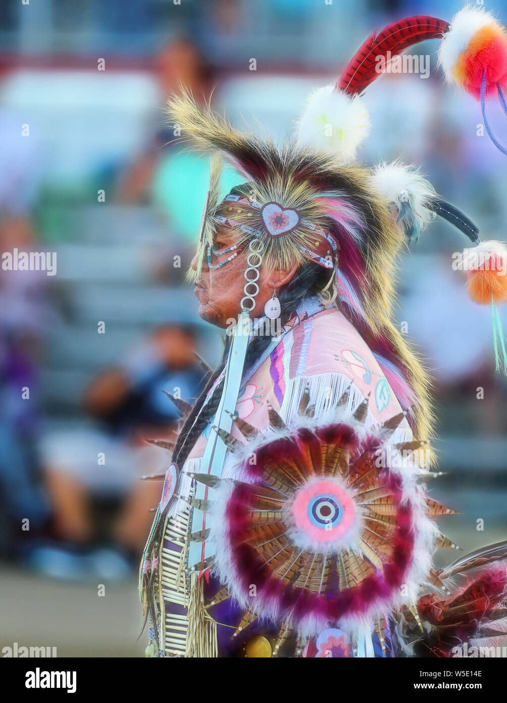 Dancers perform during the Grand Entry of the Julyamsh Pow Wow in Coeur