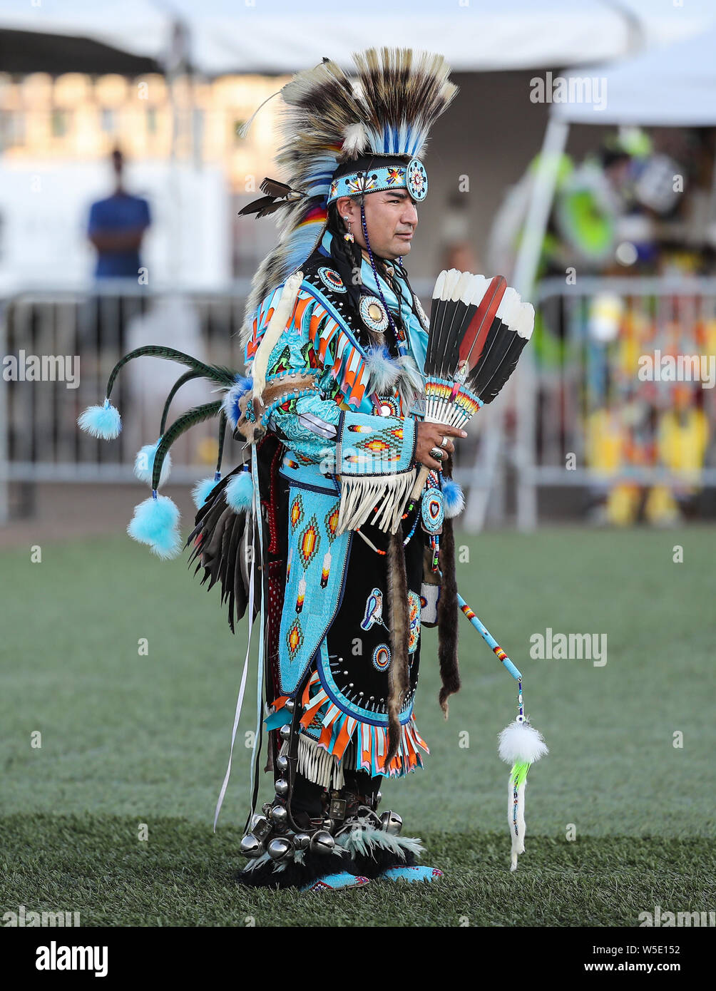 Dancers perform during the Grand Entry of the Julyamsh Pow Wow in Coeur
