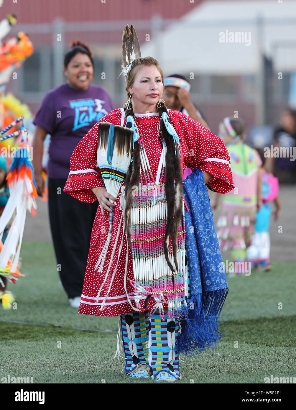 Dancers perform during the Grand Entry of the Julyamsh Pow Wow in Coeur