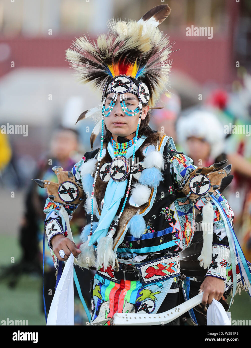 Dancers perform during the Grand Entry of the Julyamsh Pow Wow in Coeur