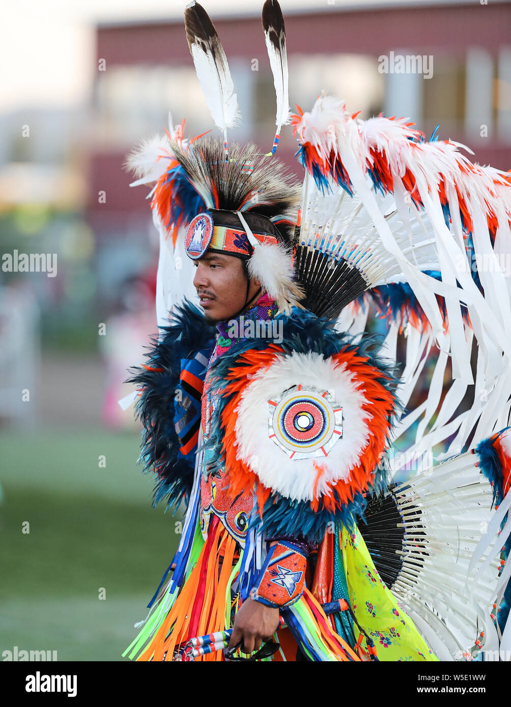 Dancers perform during the Grand Entry of the Julyamsh Pow Wow in Coeur