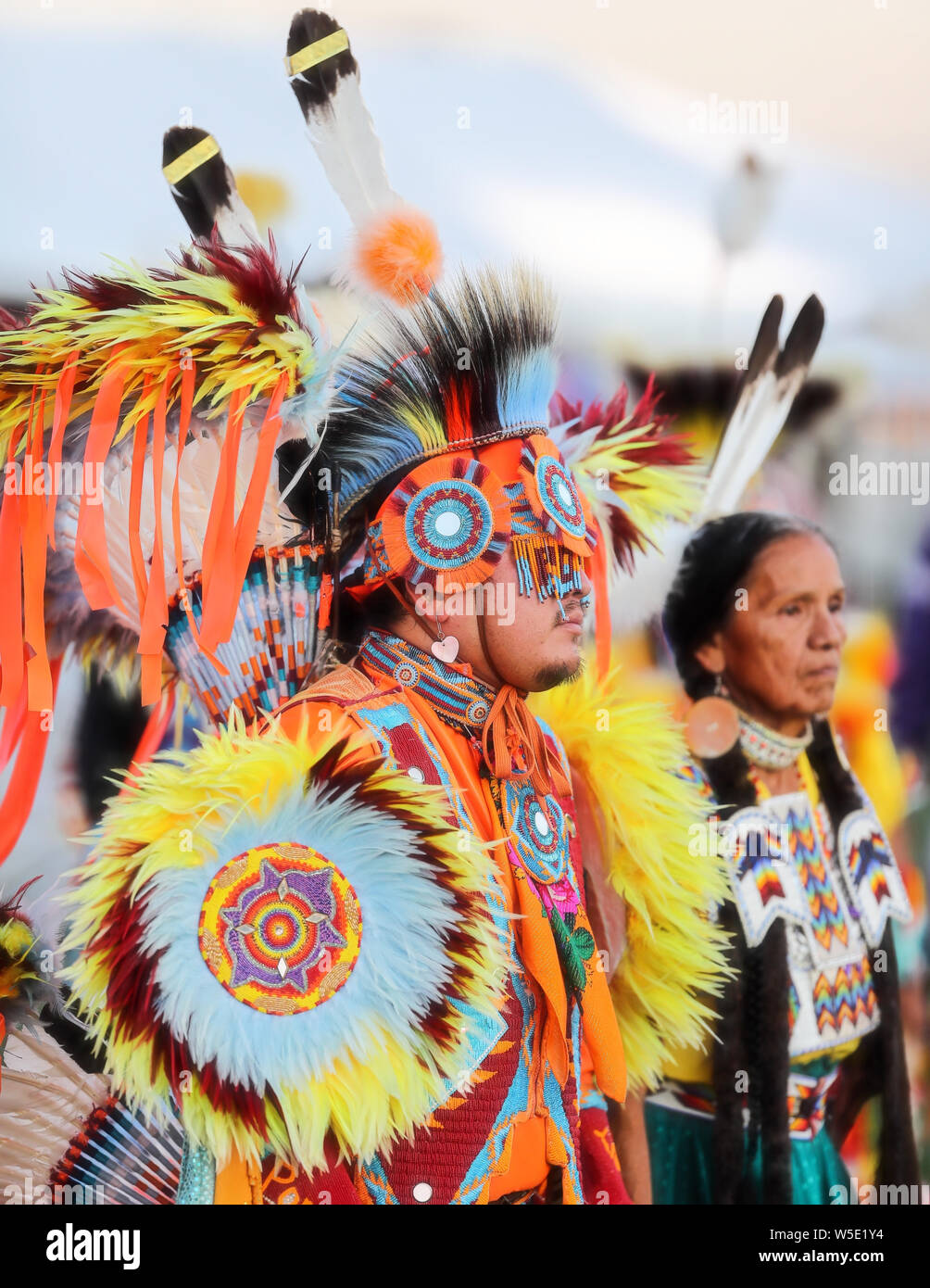 Dancers perform during the Grand Entry of the Julyamsh Pow Wow in Coeur