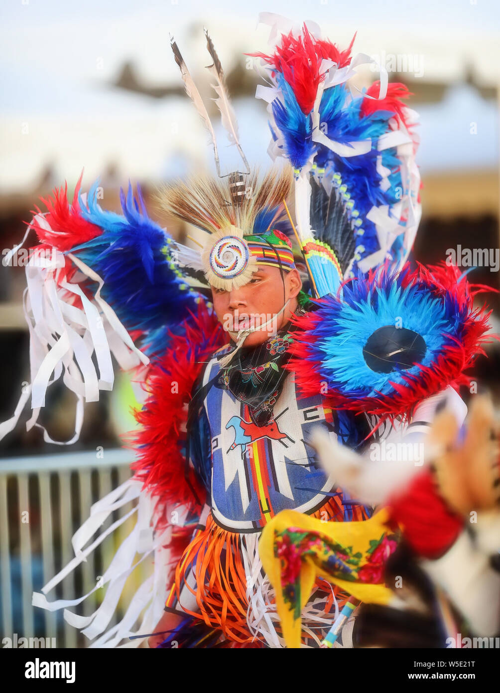 Dancers perform during the Grand Entry of the Julyamsh Pow Wow in Coeur