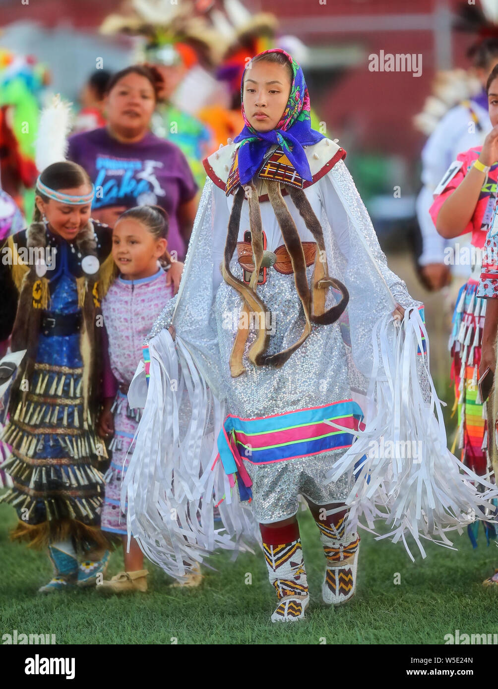 Dancers perform during the Grand Entry of the Julyamsh Pow Wow in Coeur