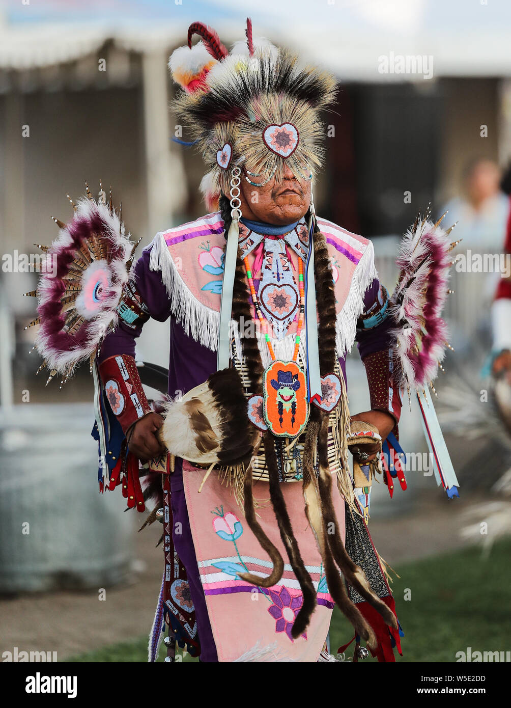 Dancers perform during the Grand Entry of the Julyamsh Pow Wow in Coeur