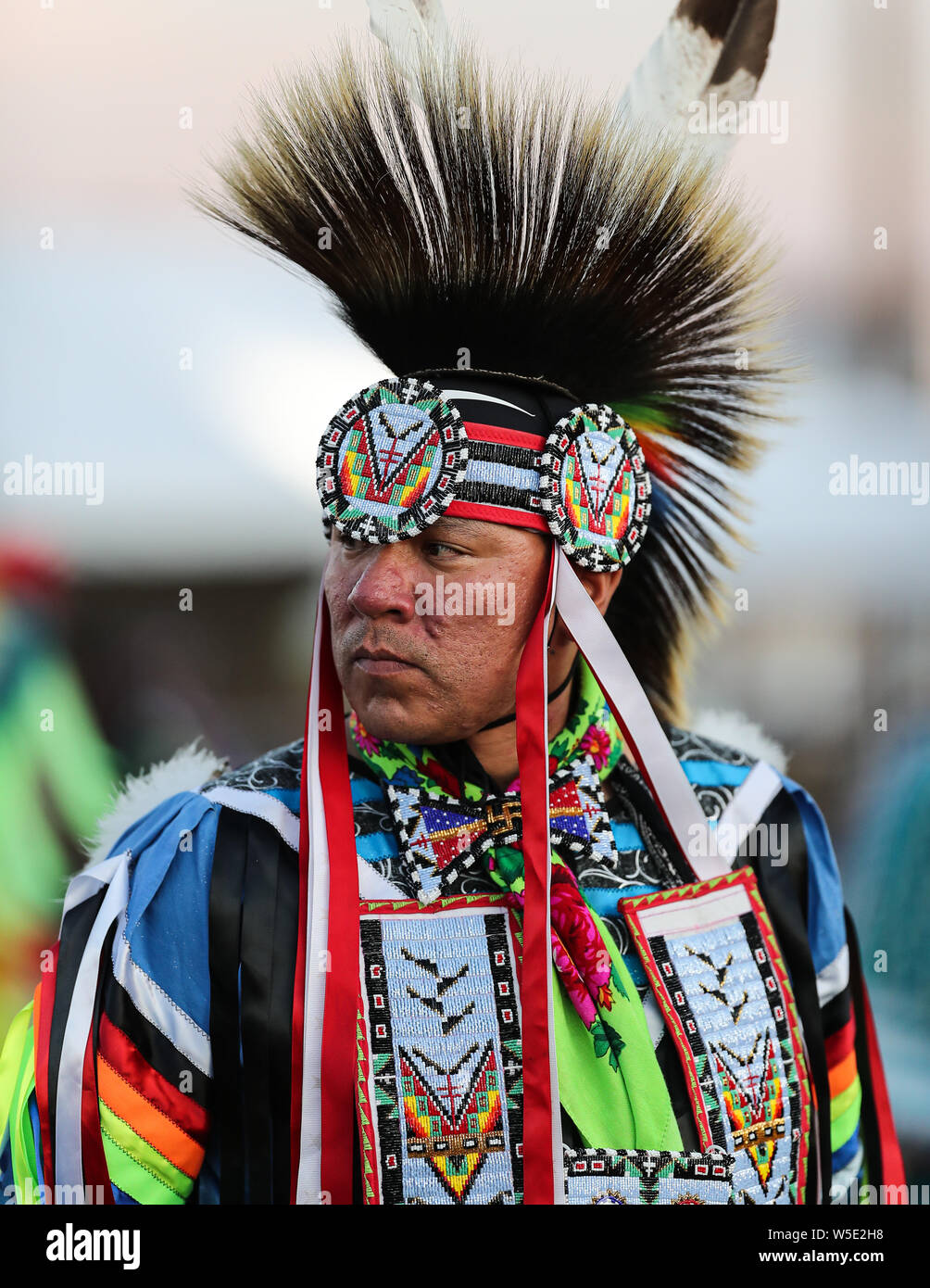 Dancers perform during the Grand Entry of the Julyamsh Pow Wow in Coeur