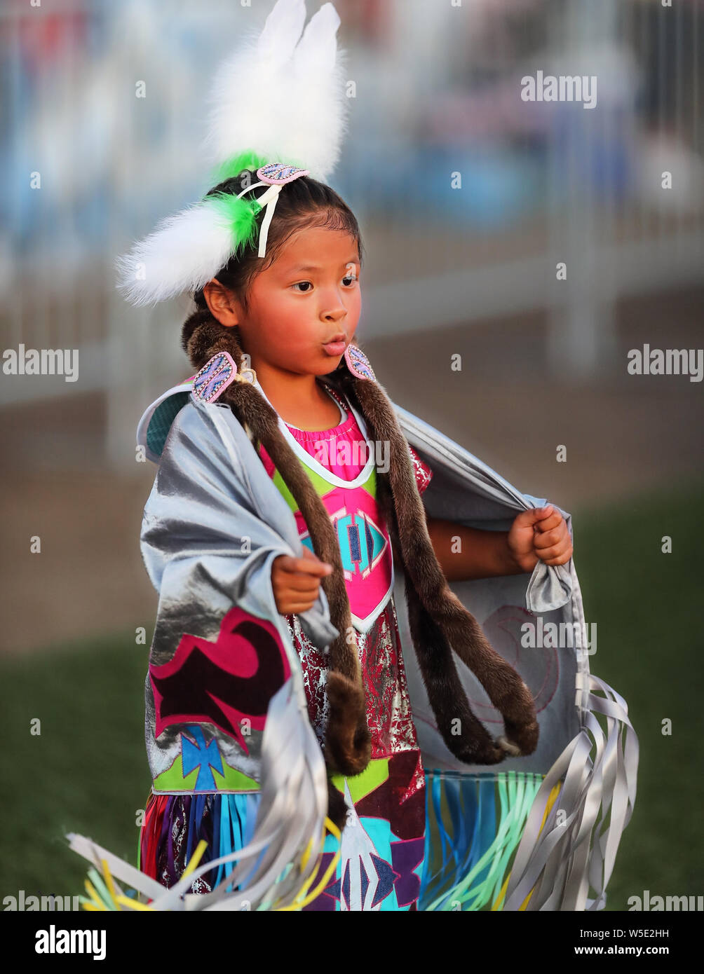 Dancers perform during the Grand Entry of the Julyamsh Pow Wow in Coeur