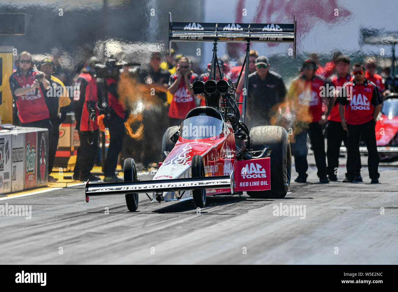Sonoma, California, USA. 28th July, 2019. Doug Kalitta launches his top fuel dragster during the NHRA Sonoma Nationals at Sonoma Raceway in Sonoma, California. Chris Brown/CSM/Alamy Live News Stock Photo