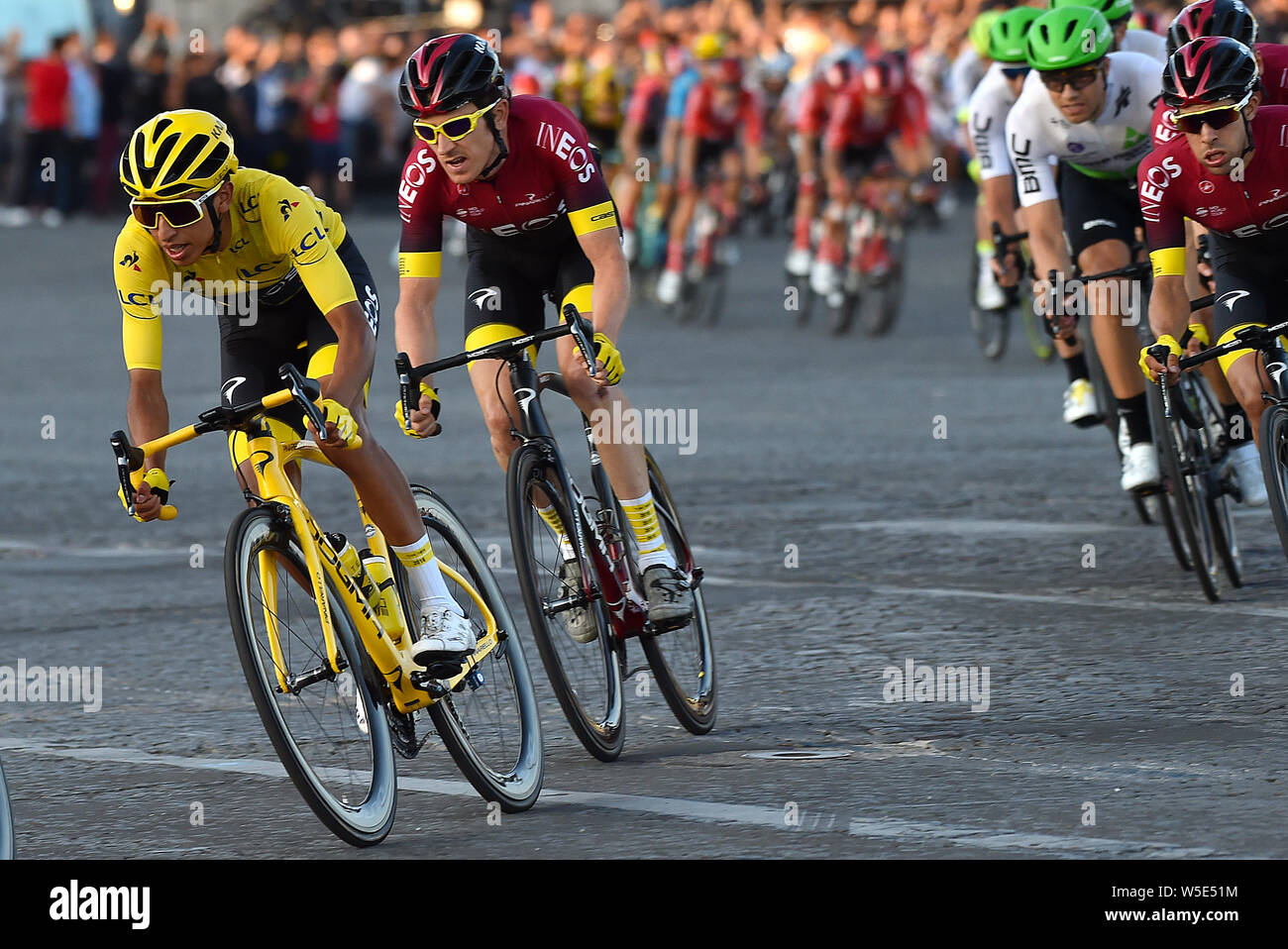 Team Ineos' Egan Bernal and Geraint Thomas during stage 21 of the Tour de France. during stage 21 of the Tour de France during stage 21 of the Tour de France. Stock Photo